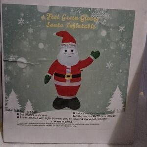 Festive Santa Inflatable with Green Gloves
